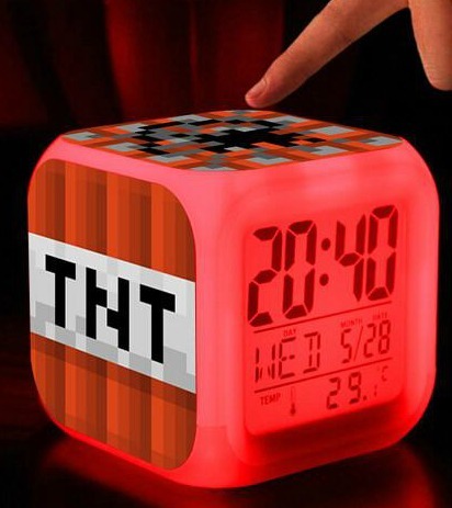 breakawaygeek:  Geek out with this   Minecraft alarm clock with LED multifunction night light!* Glowing LED with 7 Color Change* Plays 8 Alarm Songs* Displays - Hour -Minute-Date-Month-Week- Temperature* Alarm and Sleep Function* Excellent Night Light