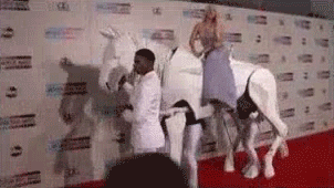 yahooentertainment:  On a Horse: Lady Gaga arrives at the 2013 American Music Awards.