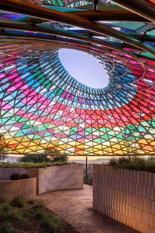 Mosaic Canopy Made of 832 Colorful Glass Tiles Reflects a Spectrum of Sunlight
Nestled in the valley of a Sonoma winery, a colorful mosaic canopy provides a unique tasting space. Designed by Studio Other Spaces—founded in 2014 by artist Olafur...