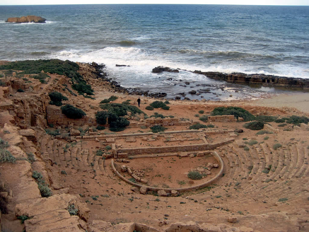 ancientart:  The seaside remains of the ancient Greek theatre at Apollonia, Cyrenaica.Photo