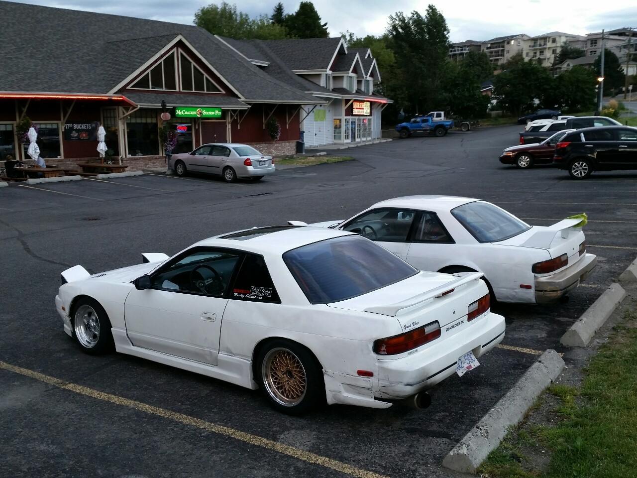 thislifeintransit:  couple bone heads with trashy white cars