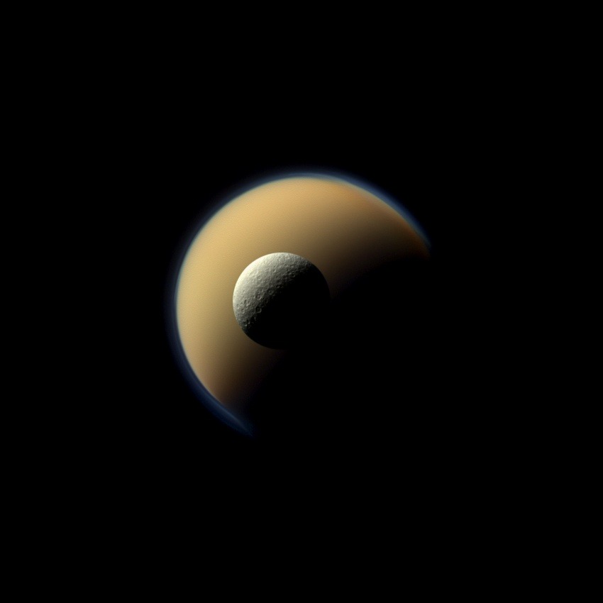 spaceexp:  Fire and Ice: Saturn’s largest and second largest moons, Titan and Rhea,