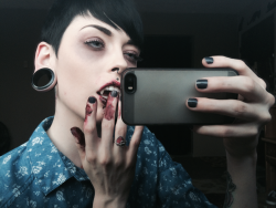 ciarachimera:  Guess who found their fangs from last Halloween? Some one come feed me 💋