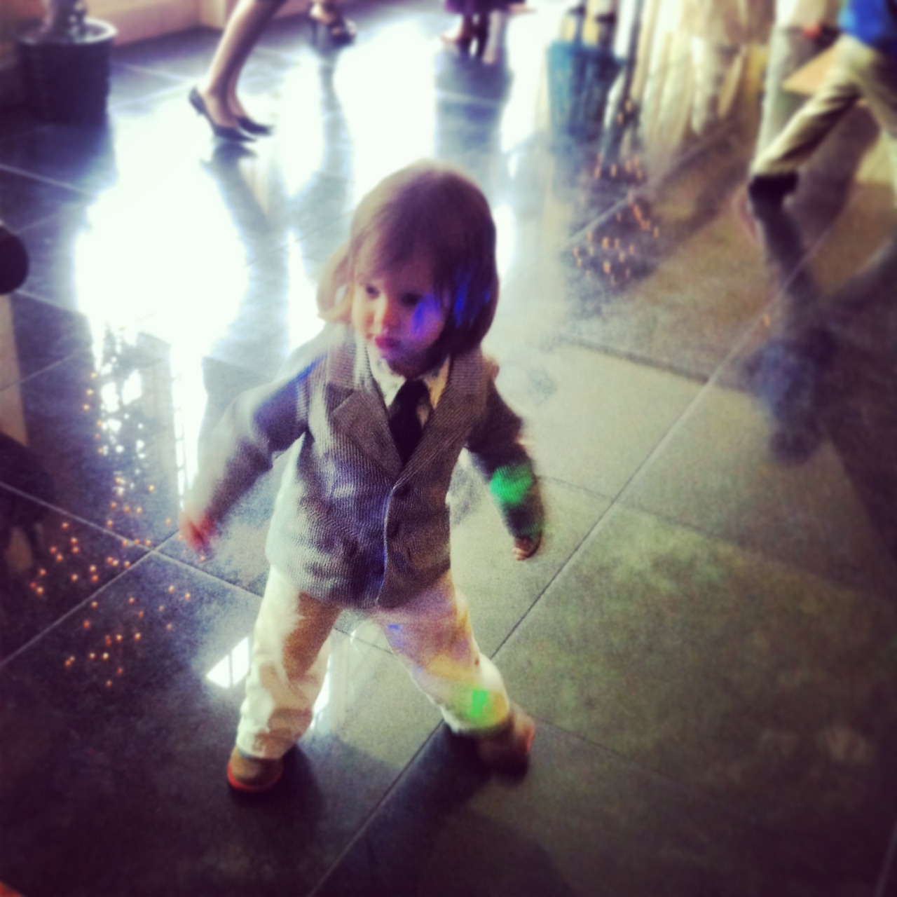 J dancing his little tush off this past weekend at a family wedding.