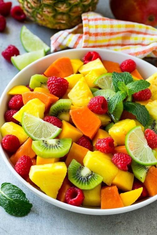 foodffs:This recipe for tropical fruit salad is a colorful mixture of mango, pineapple, papaya, kiwi