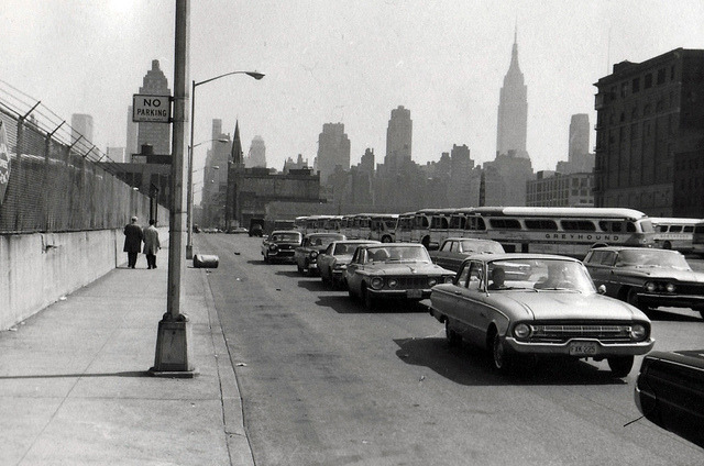 retronewyork:  A line of 1950s cars and 1960s cars (including a Ford Falcon) wait