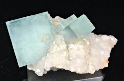 hematitehearts:  Sky Blue Fluorite on QuartzSize: