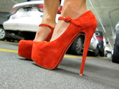 (via Christian Louboutin Suede Lady Daf platform pumps)