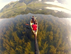 sixpenceee:  canoeing in a crystal clear