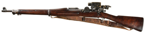 A Springfield Model 1903 bolt action rifle with Model 1913 Warner and Swasy 5.2 power telescopic sig