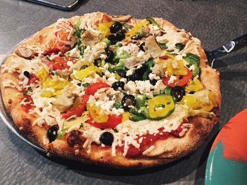 theblondeyogini:  This is a crappy picture tbh but I just found it on my camera roll and wanted to share. This is the beautiful vegan pizza I get, like, 3x a month. All the vegetables   Daiya mozzarella shreds   crumbled tofu.