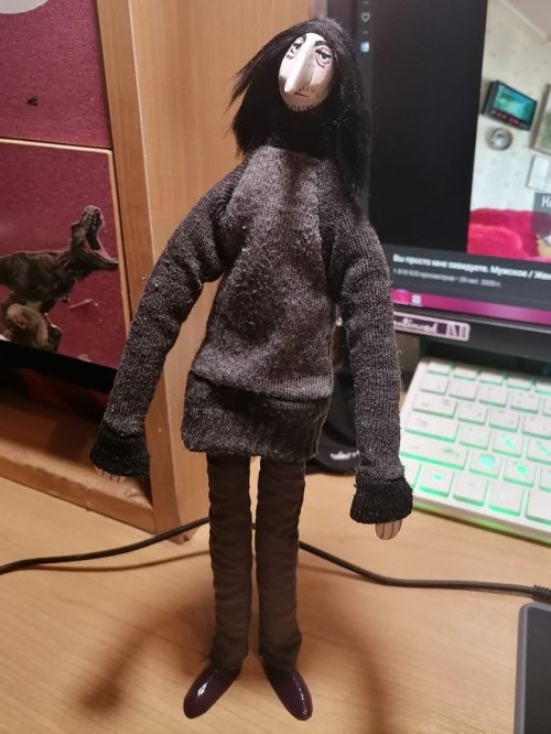 my babySnape is so poor that he had to sew a sweatshirt out of socks (sorry)
