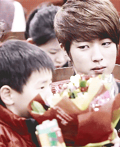 yuu-n:  sungyeol’s glance and small smile when the kid buried his face in his flower bouquet