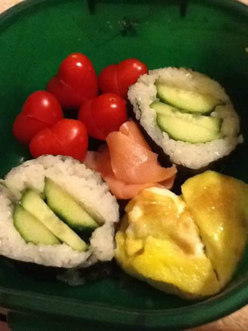Old bento and sushi. Much approved on the rolls.Top: salmon nigiri,tuna nigiri,California rolls,