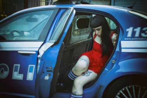 Unhappy girl Left all alone Playing solitaire Playing warden to your soul You are locked in a prison