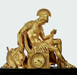 hadrian6:  French Empire Gilt Bronze Mantle Clock Bearing the Likeness of Alexander.  André-Antoine Ravrio (1759, Paris – 1814, Paris)  http://hadrian6.tumblr.com