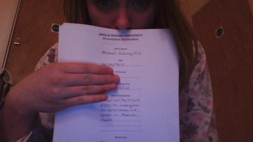 Just chillin’ in my PJs with my Dissertation printed in hand… ready to cry because I have to 