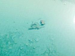 sixpenceee:   The crystal clear water of Lake Michigan. After winter, you can see shipwrecks from the sky.     Dude no way really Lake Michigan is that clearHolly macaroni