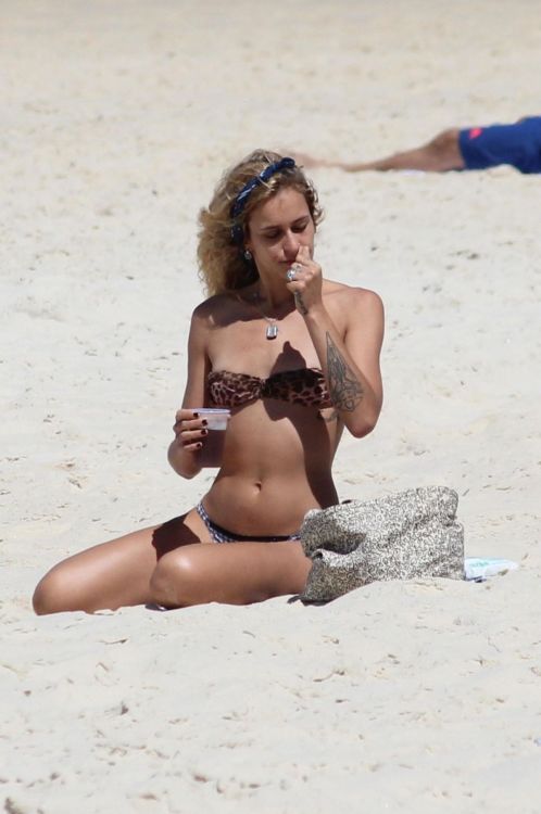 toplessbeachcelebs:  Alice Dellal (Brazilian Model) having difficulty keeping her nipples in her bikini in Rio de Janeiro (October 2013)