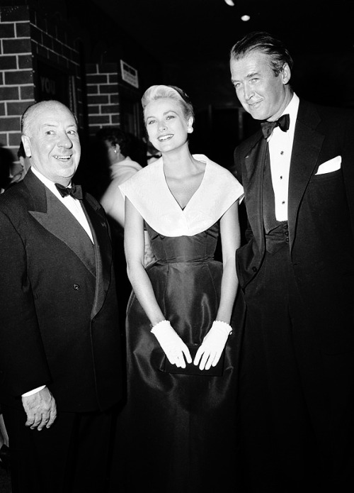 sparklejamesysparkle: Alfred Hitchcock, Grace Kelly, and Jimmy Stewart attend the premiere of &ldquo