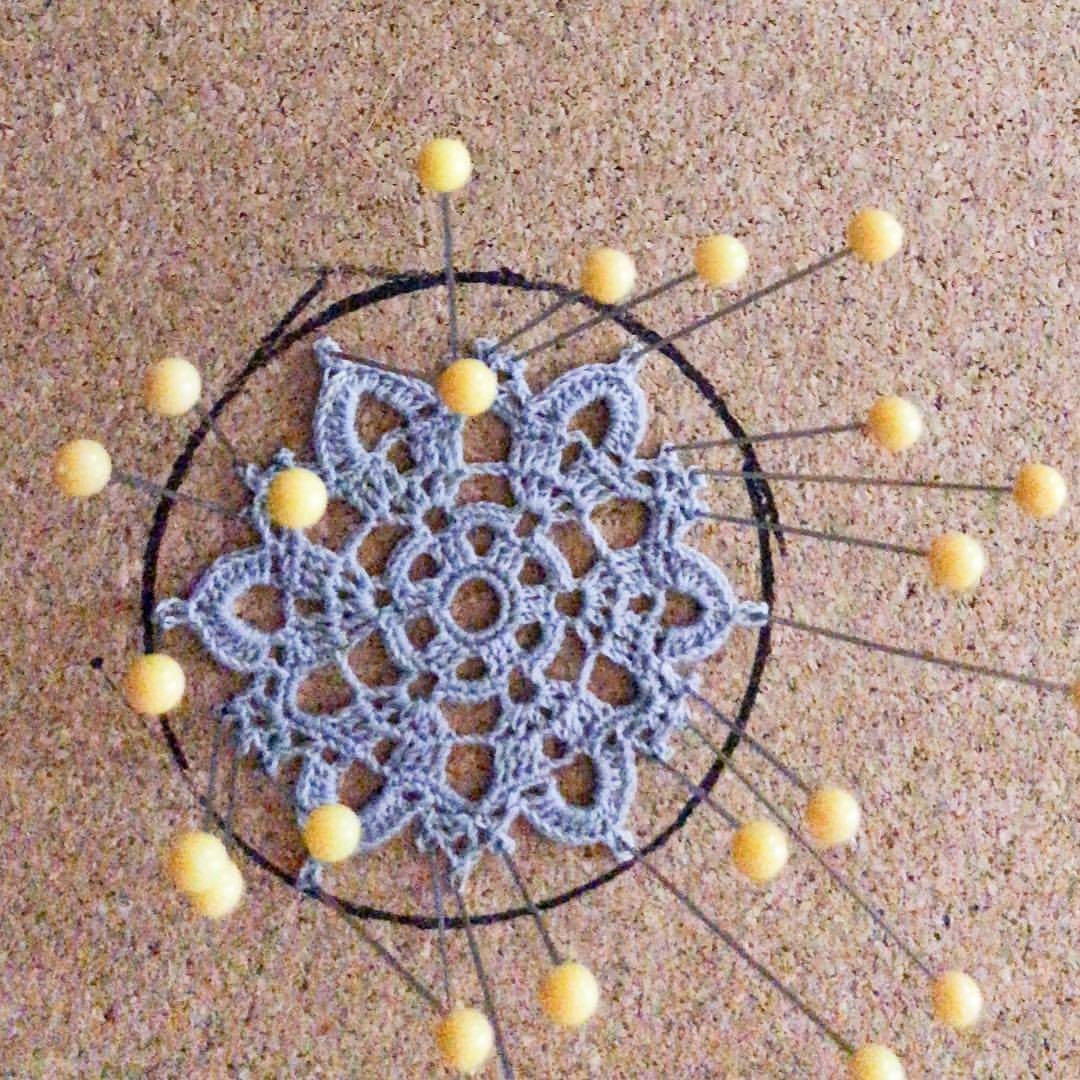 Two of these tiny motifs on the doily board, 2”, attaching to earring wires tomorrow #crochetearrings #crochetart #craftaddict