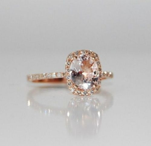 Black diamond wedding ring with pink