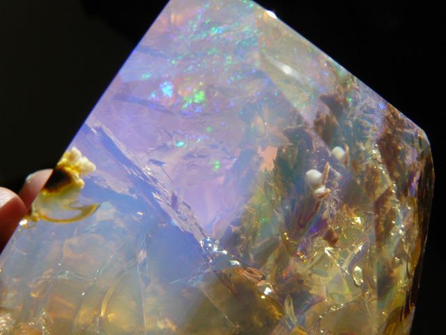 asylum-art:   Crystal Opal Looks Like a Handheld Aquarium by Inna Gem   Crystals