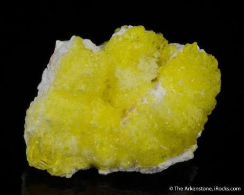 JouravskiteThis lovely lemony yellow crust and crystal is a rare calcium manganese sulphate mineral.