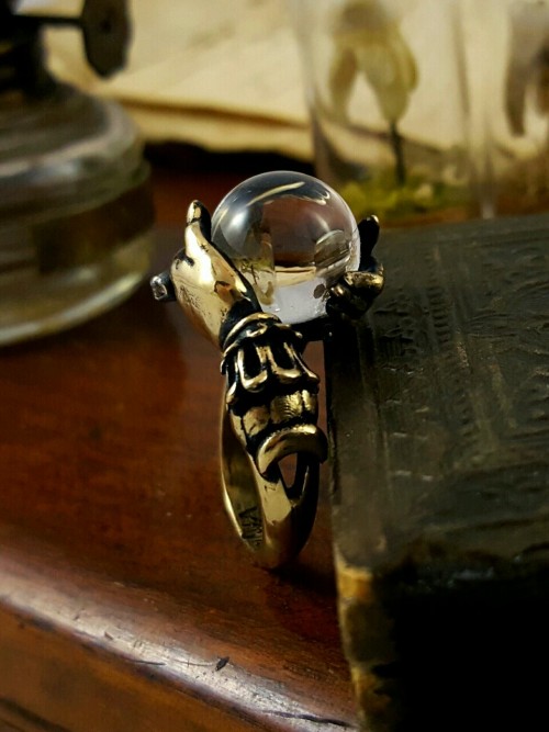 Oracle ring in antiqued brass with natural water clear quartz sphere. www.omniaoddities.com