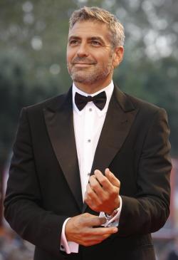 janeknowsbestdear:  goldenxviews:   ”I’m a method actor. I spent years training for the drinking and carousing I had to do in this film”                                            George Clooney  Yummy