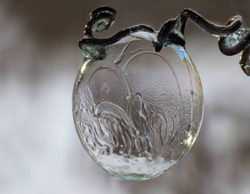 asylum-art:  When You Blow Soap Bubbles in Freezing Cold Weather If you blow soap bubbles in freezing cold weather, amazing crystals of ice form on their surface  starting at the bottom and expanding upwards until the entire bubble is covered. Each bubble