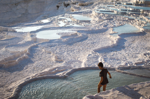 sixpenceee:    The Pamukkale Rock Pools in Turkey    The natural rock pools in Pamukkale, Turkey is an extraordinary natural wonder. The mineral-rich waters rise from the ground at a temperature of 35°C and tumble down the mountain from a height of 100