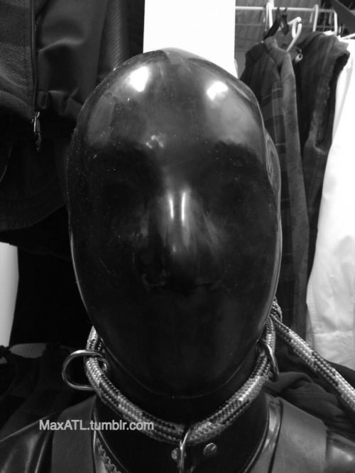 maxatl:  Me yesterday: faceless rubber GIMP! Only means of breathing are the two tubes in my nose. Posture collar tied to a noose in the wall. 