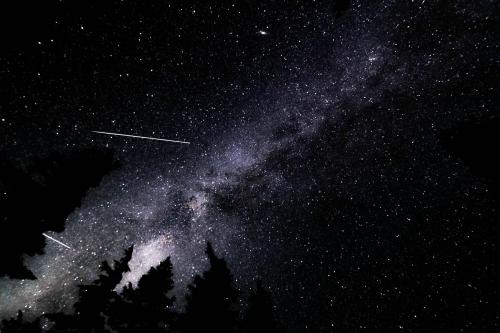 spaceexplorationphotography:  Two Perseid meteors, Milky Way, and Andromeda.  Source: imgur.