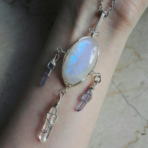 90377: The pendant I made yesterday night, big rainbow moonstone with tiny tanzanite aura quartz poi