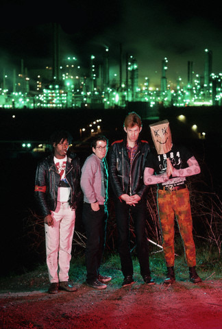 jell-obiafra:Dead Kennedys pose in front of an oil refinery. (1984)