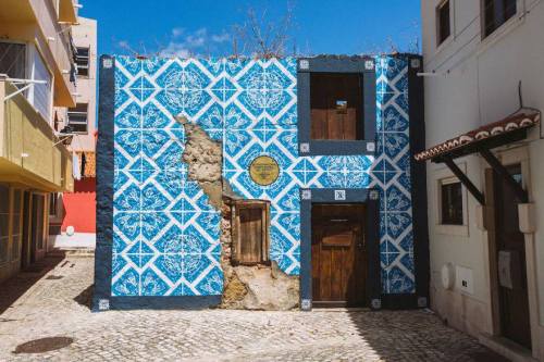 Portuguese artist creates street art Inspired by traditional portuguese tileworkNational Geographic Channel 