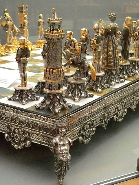 treehugger52:  oldgrandfatherclock: This Silvered and Gilded Bronze Vasari Figural Chess Set rests on a board of silver framed polished Italian onyx by mharrsch on Flickr  Want… 