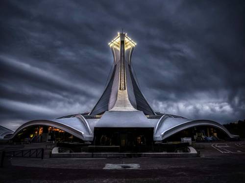 evilbuildingsblog:  Olympic Stadium, Montreal, 2021. Delightfully evil.