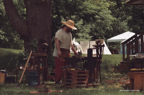 one of my smithy friends working his forge last weekend[image description: four photos of a white ma