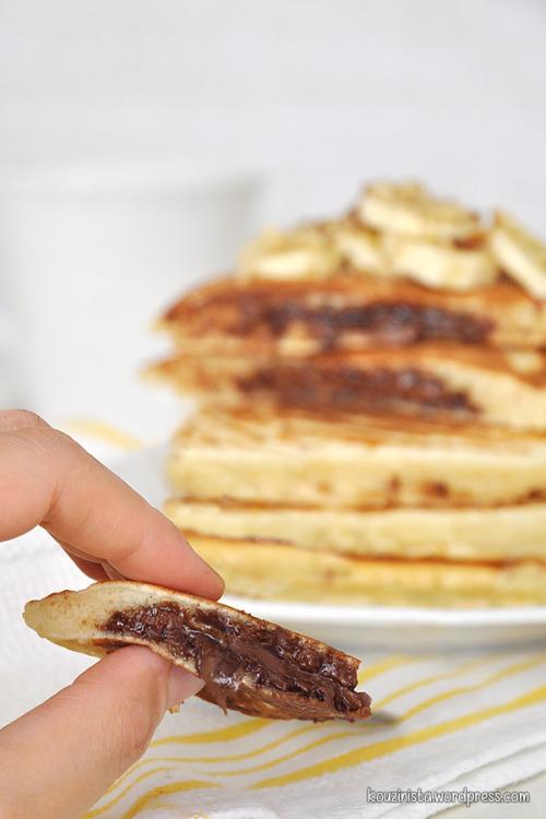 deliciousanddivine:  sweetoothgirl:  Nutella Stuffed Pancakes I’ve made Nutella stuffed pancakes before…but they were Nutella stuffed Churro pancakes…immediately dip them in cinnamon sugar when you take them off the griddle…you won’t be sorry.