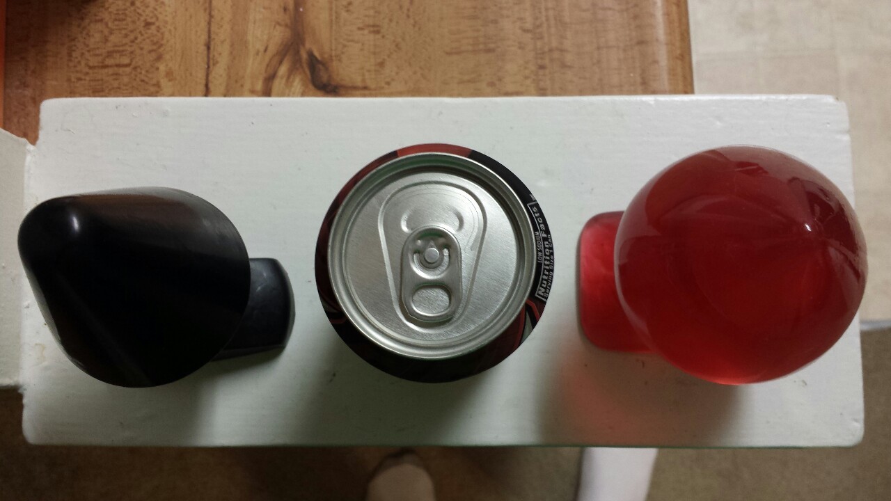 My two large plugs with a soda can for size reference. Ace of Spades on the right.
