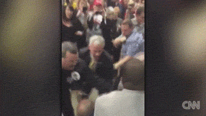 apachelastwords:  thingstolovefor:    A #BlackLivesMatter activist was hit, kicked and pushed to the ground at a Donald Trump rally  At least a half-dozen attendees shoved and tackled the protester, a black man, to the ground as he refused to leave the