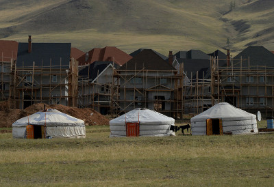 ninewhitebanners:
“ Traditional felt gers in front of new construction in Ulaanbaatar, Mongolia’s capital city. About half the population lives in gers, which are traditional nomadic homes easy to move.
”