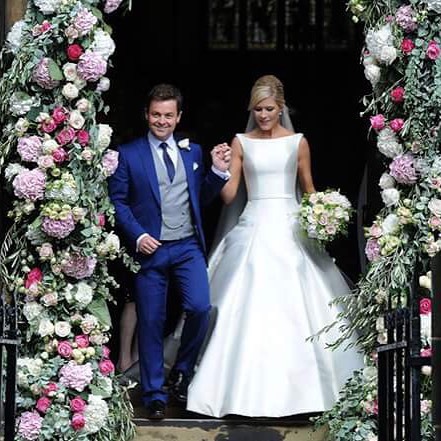 Congratulations to Declan Donnelly & Ali Astall on their wedding. Her dress and that floral arch