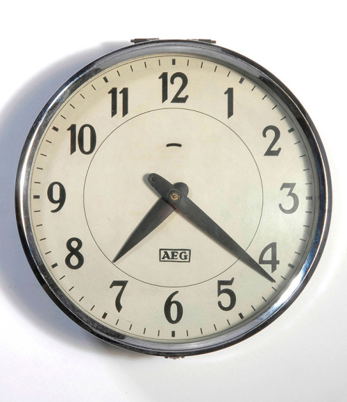 Peter Behrens, Electric wall clock for AEG Berlin, made 1926, designed 1910. Via British Museum / Qu