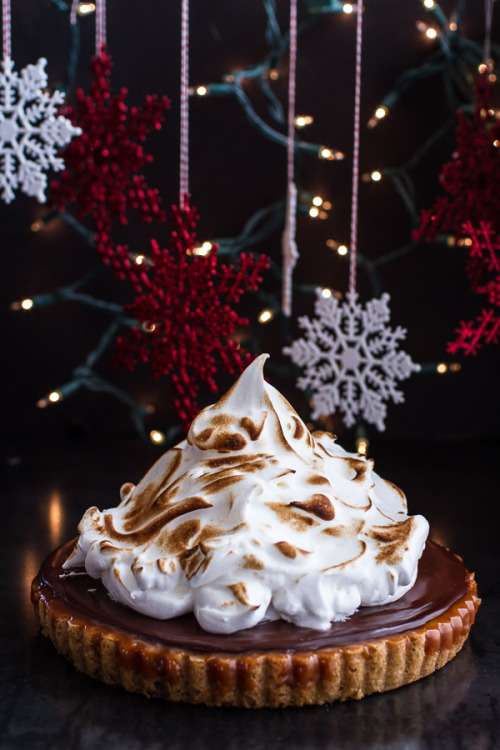 sweetoothgirl:  Chocolate Chip Cookie Bottomed Salted Rum Caramel Tart with Toasted Marshmallow 