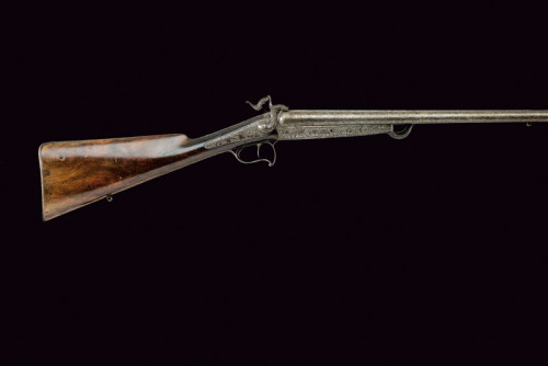 Engraved double barrel pinfire shotgun originating from Belgium, third quarter of the 19th century.