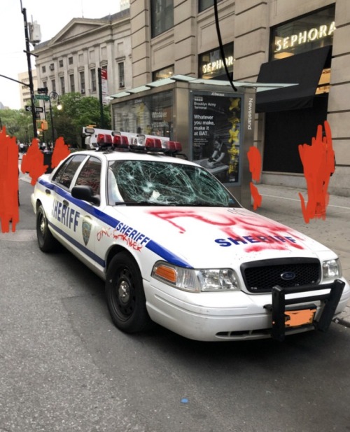 Vandalized cop car in Brooklyn, NYC during a Feorge Floyd memorial protest, on May 30, 2020