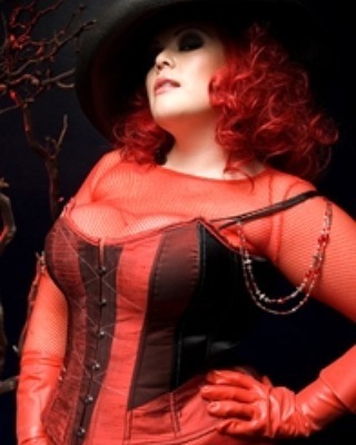 exquisiterestraintcorsets:April Flores in her #CustomCorset #overbust in a gorgeous promo shot for t